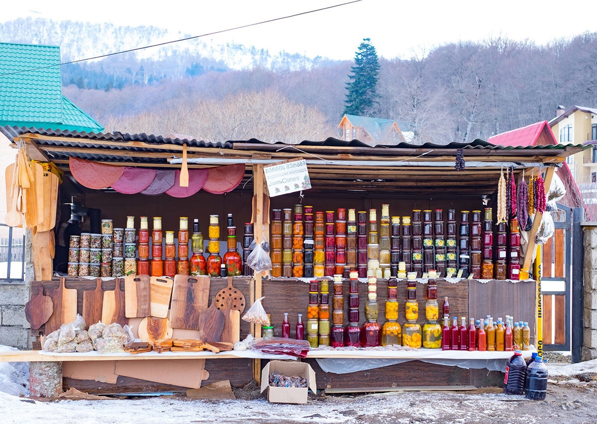 Traditional preserves, condiments and other foods for sale at the side of the road in Bakuriani.